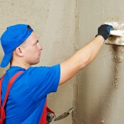 Comment le plâtre des murs avec du mortier de ciment