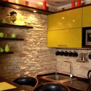 Murs en pierre dans la cuisine - options de décoration