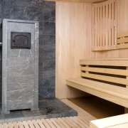 Brique tapissant le poêle du sauna: étape par étape
